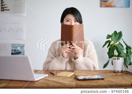 Young female creator working in the office Young female creator working in the office 97480196