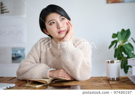 Young female creator working in the office Young female creator working in the office 97480197