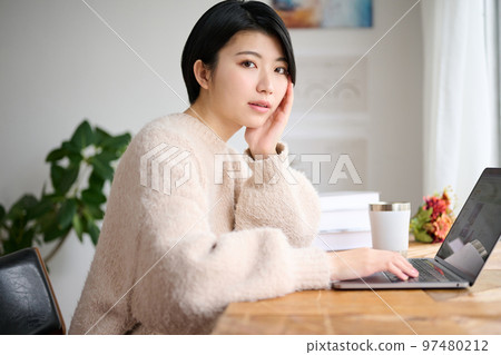Young female creator working in the office 97480212