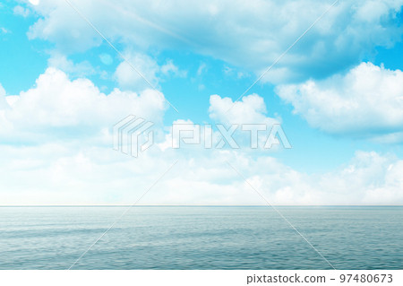 Blue sea and sky with clouds. Concept of world ocean day and conservation of the environment. Copy space 97480673