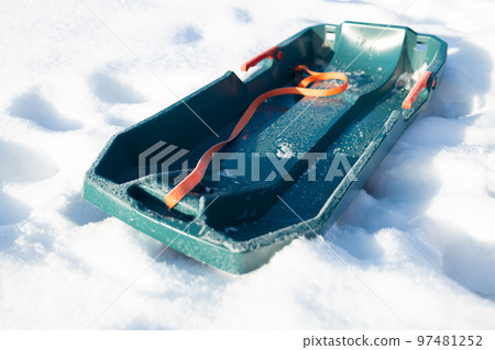 Winter sled in the snow in the winter park 97481252