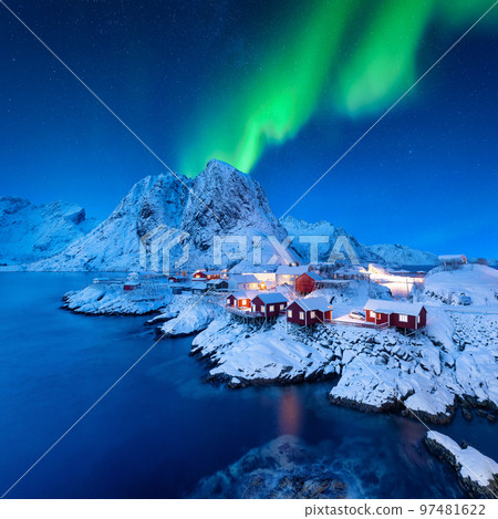 Aurora Borealis. Northern Lights. View on the house in the Hamnoy village, Lofoten Islands, Norway. Aurora Borealis. Northern Lights. View on the house in the Hamnoy village, Lofoten Islands, Norway. 97481622