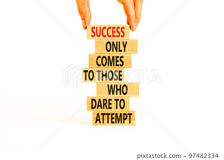 Success symbol. Concept words Success only comes to those who dare to attempt on wooden blocks. Beautiful white background copy space. Businessman hand. Business success and attempt concept. Success symbol. Concept words Success only comes to those who dare to attempt on wooden blocks. Beautiful white background copy space. Businessman hand. Business success and attempt concept. 97482334