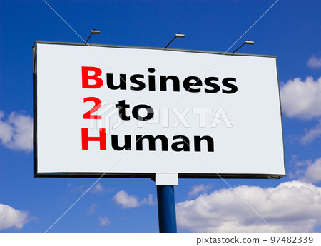 B2H business to human symbol. Concept words B2H business to human on big billboard on a beautiful blue sky and clouds background. Business and B2H business to human concept. Copy space. 97482339
