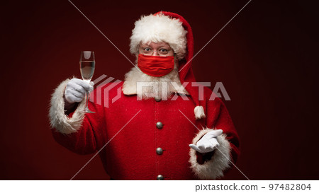 Santa Claus drinking champagne Santa Claus drinking champagne 97482804