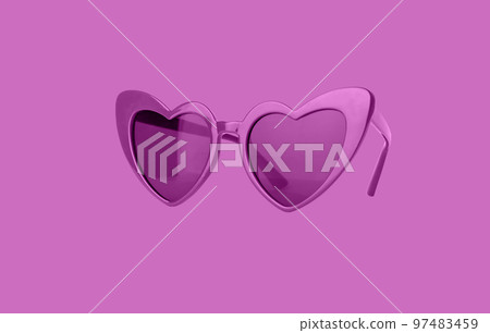 Bright pink heart sunglasses. Woman accessory for summer vacation 97483459
