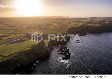 Dunseverick Castle is located west of the village of Dunseverick, in County Antrim, in Northern Ireland. 97484452