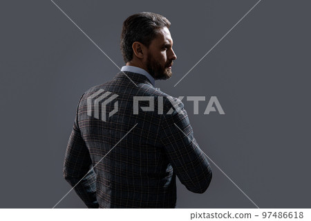 back view photo of man wearing menswear. man wear menswear formal suit. man in menswear back view photo of man wearing menswear. man wear menswear formal suit. man in menswear 97486618