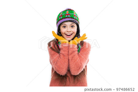 glad teen girl in earflap hat isolated on white background. teen girl wear sweater 97486652