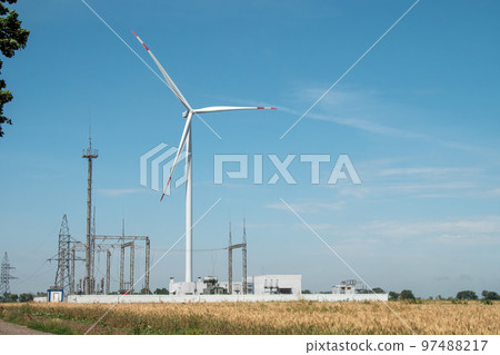 Windmill produces energy at distribution substation 97488217