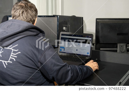 Manager enters information about new charging EV plugs Manager enters information about new charging EV plugs 97488222