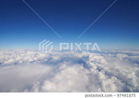 Clouds seen from the sky blue sky 97491875