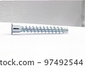 Furniture self-tapping screw, isolated on white background. Confirmat. Euro screw. 97492544