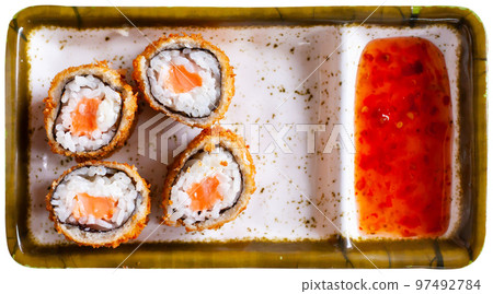Portion of fried sushi maki with salmon Portion of fried sushi maki with salmon 97492784