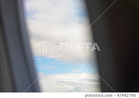 Airplane taking off viewed from inside the plane 97492790