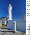 White mailbox and chalk lighthouse 97494692