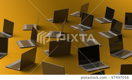 A collection of laptop computers yellow background 97497056