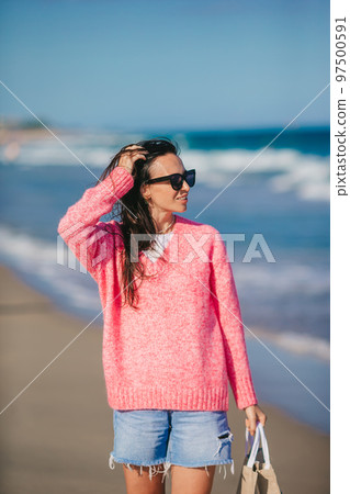 Young beautiful woman on the beach vacation 97500591