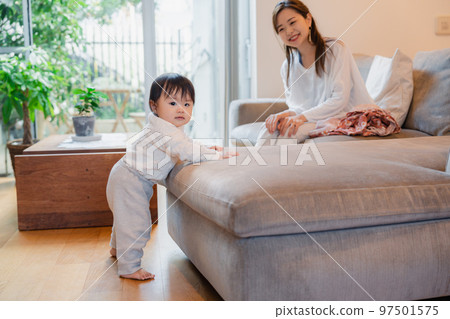 mother living with baby at home mother living with baby at home 97501575