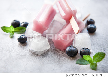 Homemade blueberry ice cream or popsicles 97501930