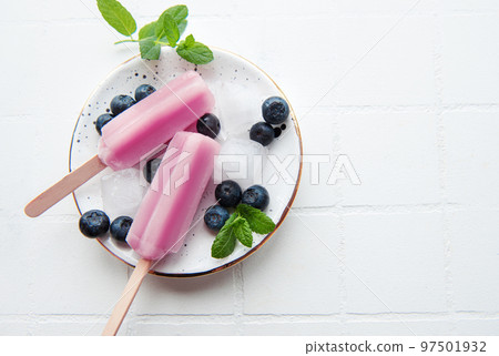 Homemade blueberry ice cream or popsicles Homemade blueberry ice cream or popsicles 97501932