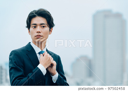 Businessmen working in the city Businessmen working in the city 97502458