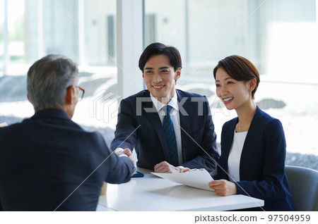 Businessman shaking hands Businessman shaking hands 97504959