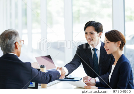 Businessman shaking hands Businessman shaking hands 97504960