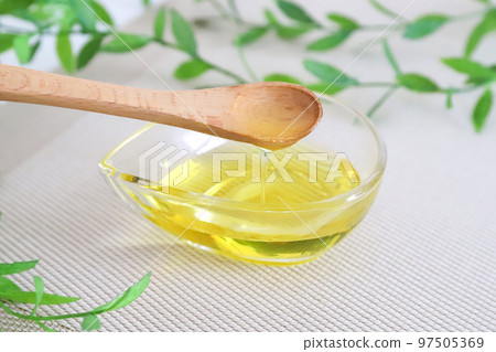 olive oil and spoon olive oil and spoon 97505369