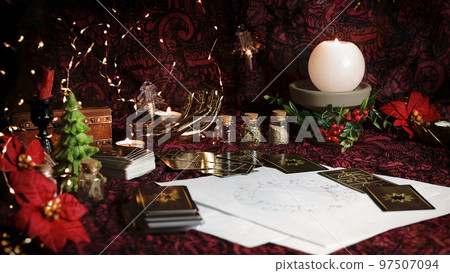 Tarot reader or Fortune teller reading on Christmas decoration. Tarot reader or Fortune teller reading on Christmas decoration. 97507094