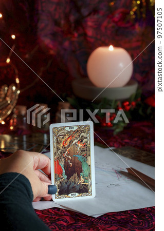 Tarot reader or Fortune teller reading on Christmas decoration. Tarot reader or Fortune teller reading on Christmas decoration. 97507105
