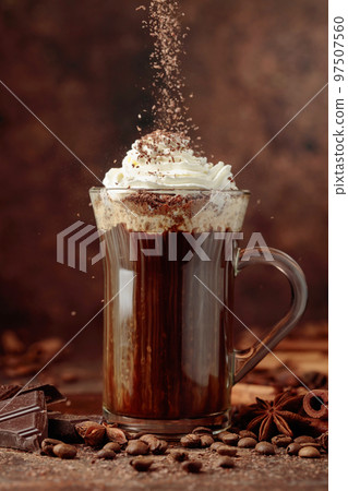 Coffee with whipped cream sprinkled with chocolate crumbs. Coffee with whipped cream sprinkled with chocolate crumbs. 97507560
