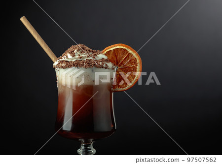 Chocolate cocktail with whipped cream sprinkled with chocolate chips. Chocolate cocktail with whipped cream sprinkled with chocolate chips. 97507562