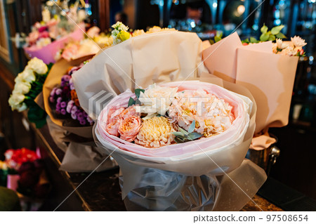 lots of bouquets. different beautiful floral arrangements. 97508654