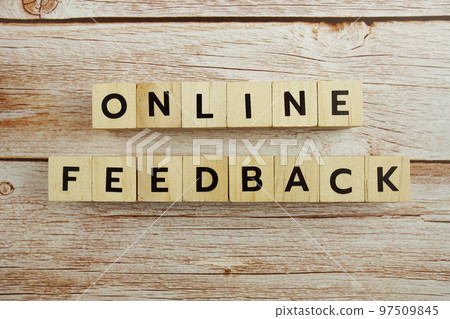 Online Feedback word alphabet letters on wooden background Online Feedback word alphabet letters on wooden background 97509845