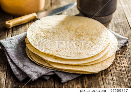 Mexican Corn Tortillas on wooden table. 97509857