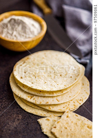 Mexican Corn Tortillas on kitchen table. 97509861