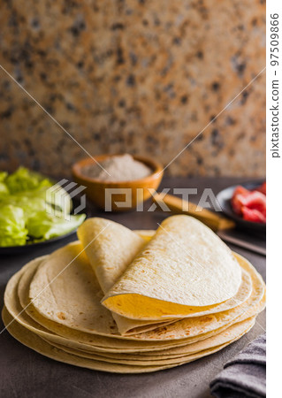Mexican Corn Tortillas on kitchen table. Mexican Corn Tortillas on kitchen table. 97509866