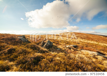 Ukraine, Magura-Jide mountains and blue sky Landscape of the Carpathian mountains. Wide open desert landscapes of the Borzhava highlands. Pylypets, National Park. 97510456