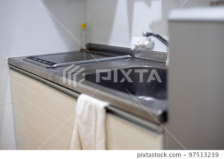 Kitchen in a studio apartment 97513239