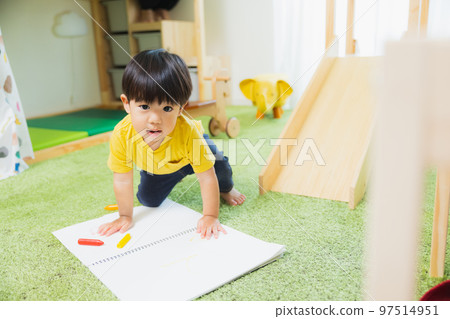 boy playing in children's room boy playing in children's room 97514951