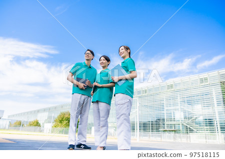 A smiling support team looking to the future 97518115