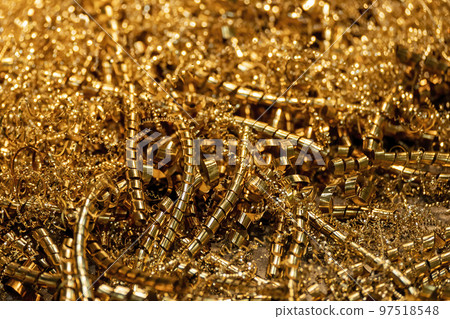 Close-up scene of  brass materials scrap from turning process. 97518548