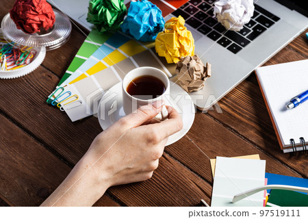 Woman blogger or columnist relax with coffee Woman blogger or columnist relax with coffee 97519111