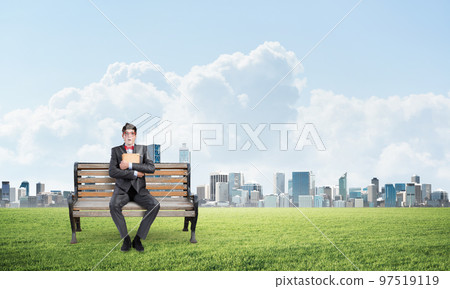 young student with a book 97519119