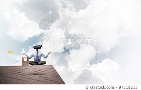 Concept of security and privacy protection with camera headed man meditating 97519215