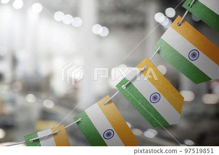 A garland of India national flags on an abstract blurred background 97519851