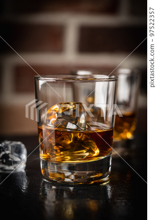Whiskey with ice in glasses 97522357