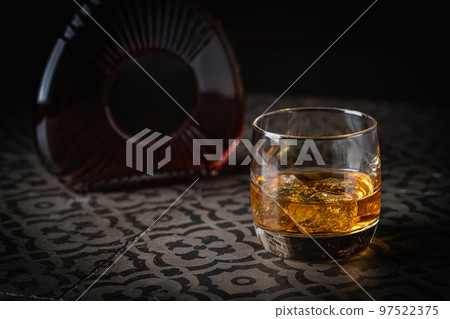 Whiskey with ice in glasses 97522375