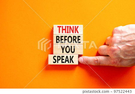 Think before you speak symbol. Concept words Think before you speak on wooden cubes. Beautiful orange table orange background. Businessman hand. Business think before you speak concept. Copy space. Think before you speak symbol. Concept words Think before you speak on wooden cubes. Beautiful orange table orange background. Businessman hand. Business think before you speak concept. Copy space. 97522443